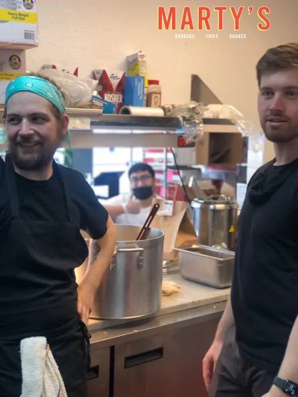 Ryan and Jeremy behind the counter